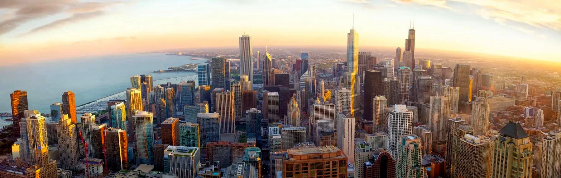 Aerial view of the Chicago skyline and Lake Michigan from high above the city