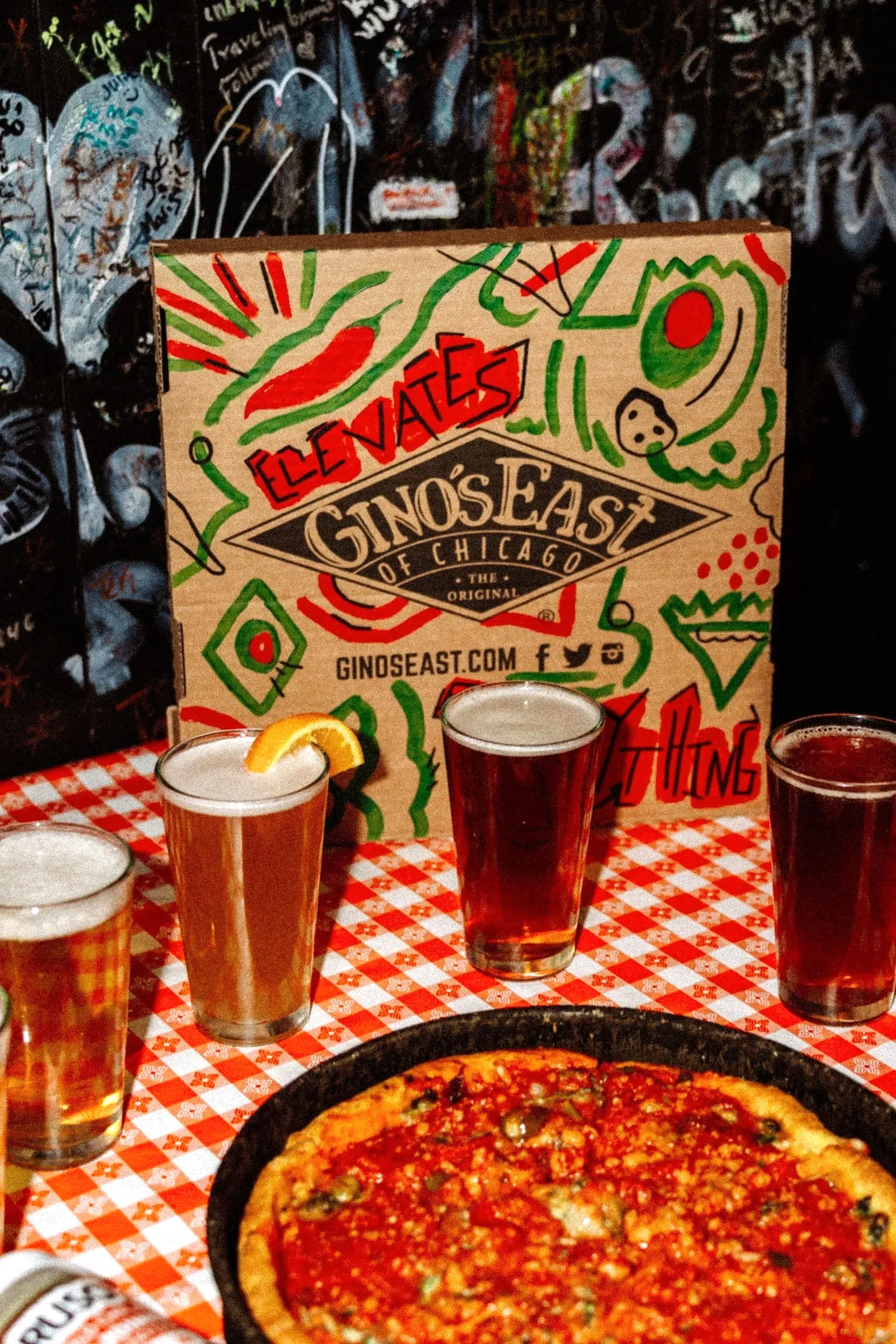 Promotional poster for the Caruso’s Hot GARDENiera pizza collaboration running March 17 to May 17