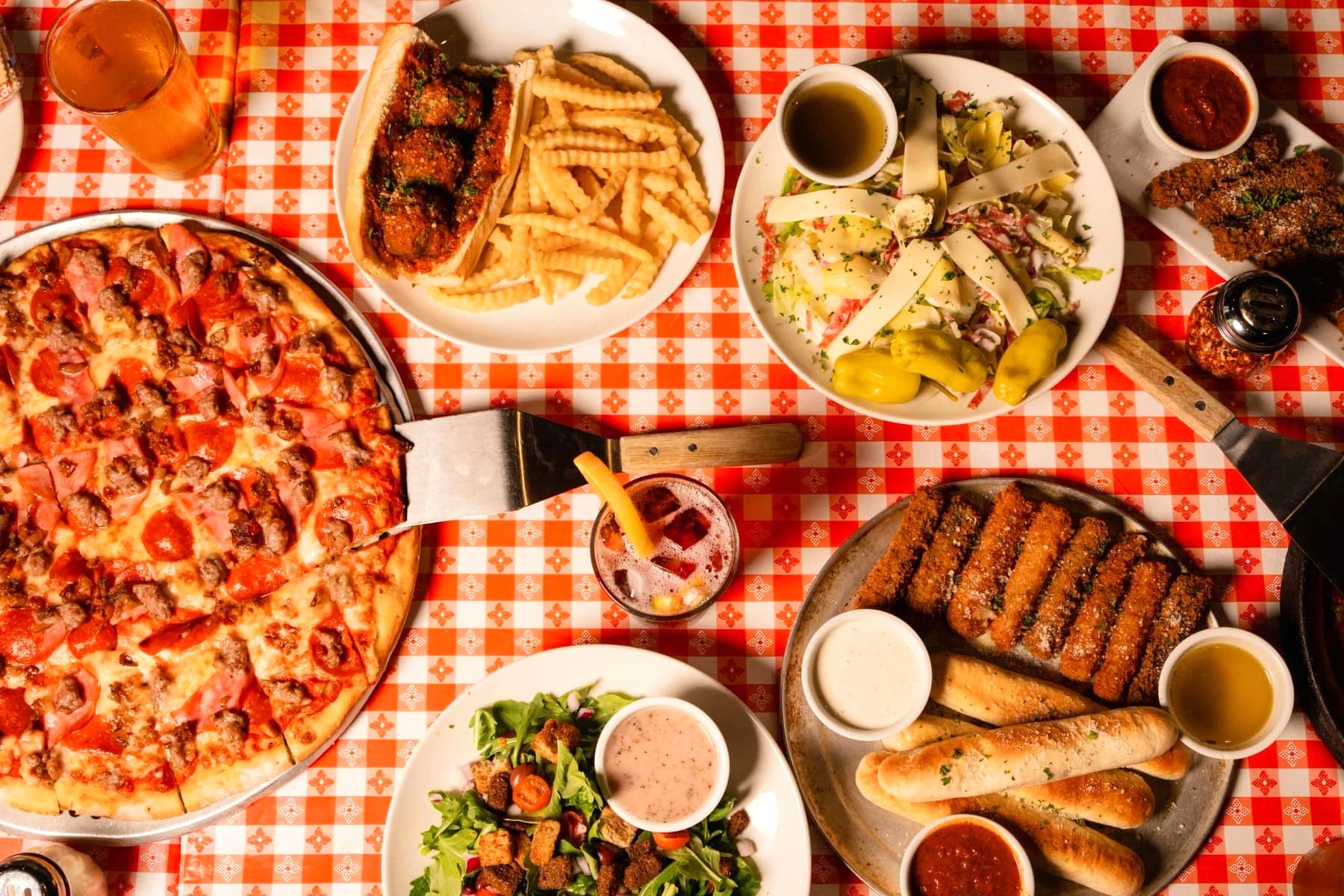 A Gino’s East catering spread laid out for a group