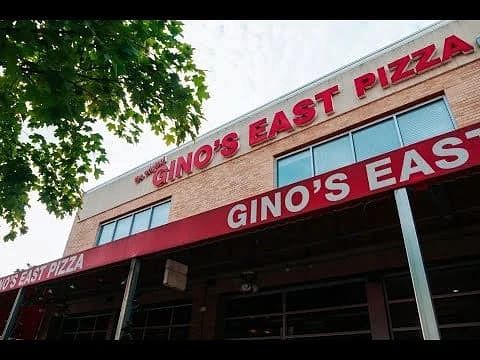 Gino's East Pizza signage on the exterior of the Wheaton restaurant