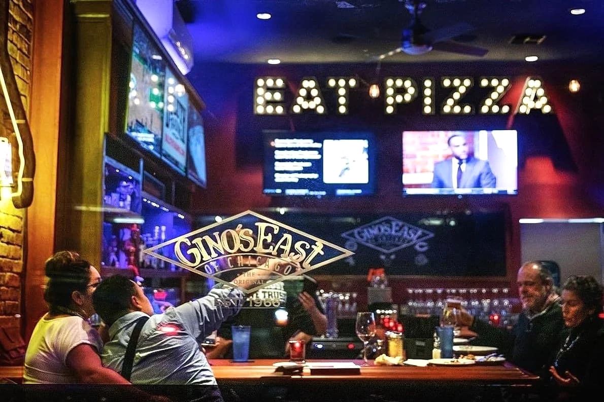 Gino's East of Chicago logo seen through the window of the Sherman Oaks bar
